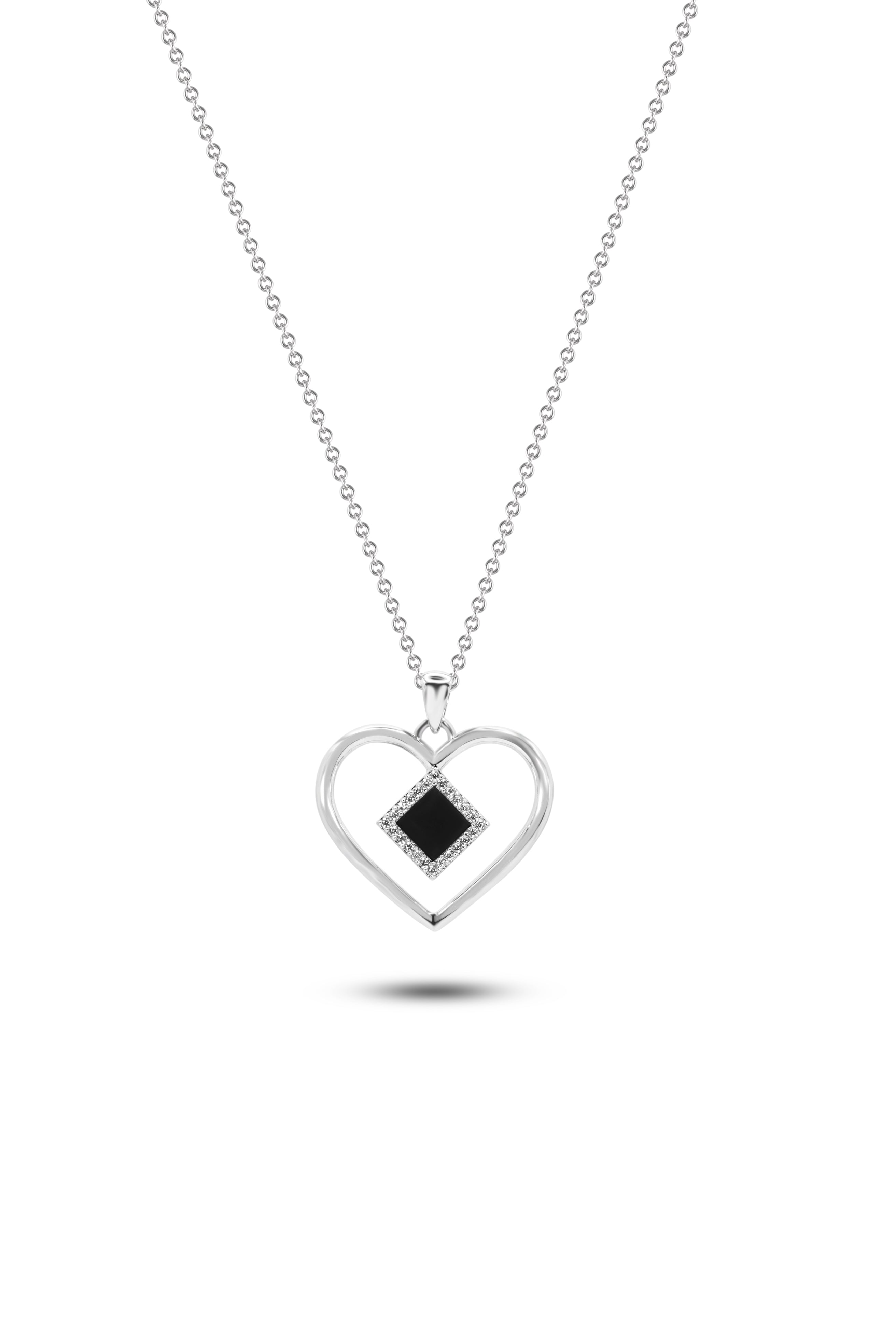 The Heart Necklace | Old Testament Edition features a heart-shaped pendant with a black diamond center and small white stones, crafted by NanoBless Christian Jewelry and elegantly displayed against a white background.