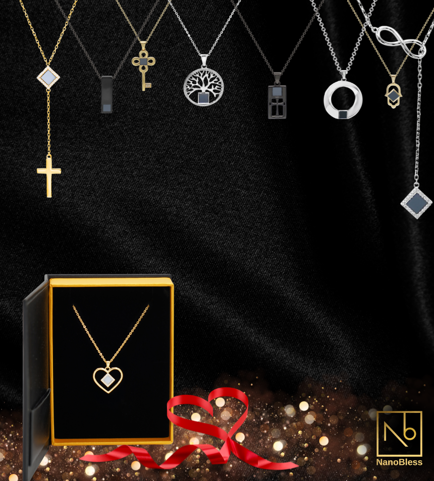 A display of nine Nano jewelry necklaces with various pendants hangs above a gold box showcasing a heart-shaped necklace. A red ribbon forms a heart shape, and the NanoBless logo appears in the bottom right corner.